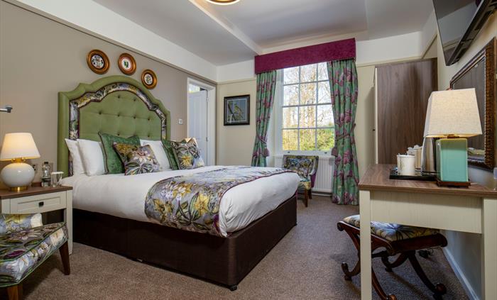 A bedroom in a luxury hotel